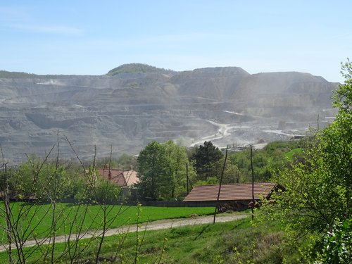 Figure 1. The village of Krivelj (Bor region, eastern Serbia), with the expanding open-cast copper mine approaching the settlement. Photo: Giustina Selvelli.